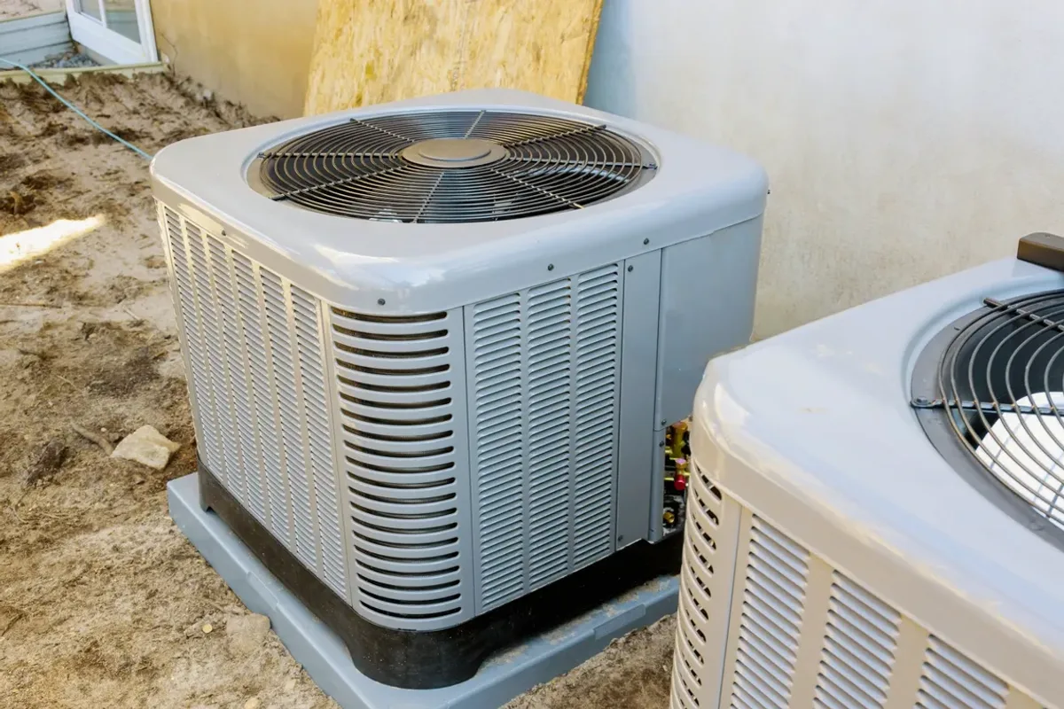 Two outdoor air conditioner condensers